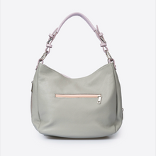 Load image into Gallery viewer, A light sage green hobo shoulder bag with a pale pink strap and a rose gold zipper pocket, shown on a white background within a mobile app screenshot.