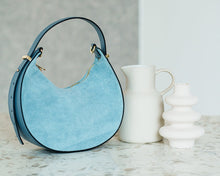 Load image into Gallery viewer, Italian leather and suede crescent shoulder bag handmade in Italy. Crafted from premium genuine leather with luxurious suede, featuring an adjustable strap, zip closure, and timeless designer-inspired style.
